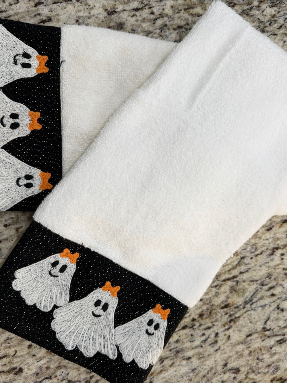 Nicole Miller White hand towels with Ghost Trim and Orange Bows